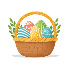 Fototapeta premium Decorated easter eggs in a woven basket with green leaves