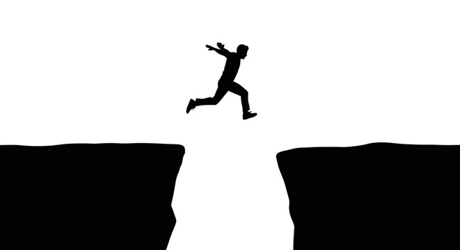 Man Jumping Across Cliff Gap.