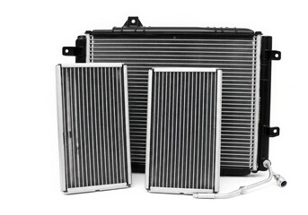 Fototapeta premium Close-up view of a car radiator with cooling fins and two fans