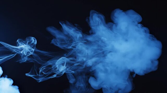 Smoke clouds floating in the air, captured from a close-up viewpoint in a dark environment