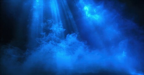 Dramatic blue lighting creates ethereal fog. Rays descend, illuminating swirling mist. Dark background emphasizes intense atmosphere.