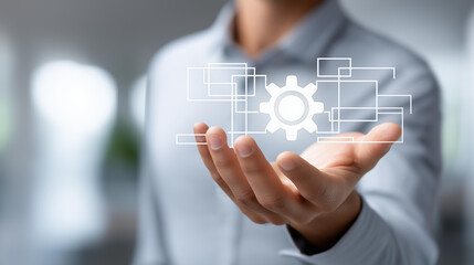 Faceless businessman holding a glowing automation icon surrounded by workflow simplification symbols, reducing manual tasks concept, operational efficiency photography, defocused