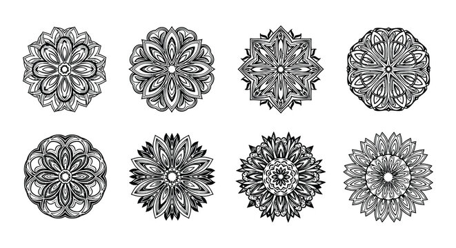 Eight intricate black and white mandalas arranged in a grid pattern