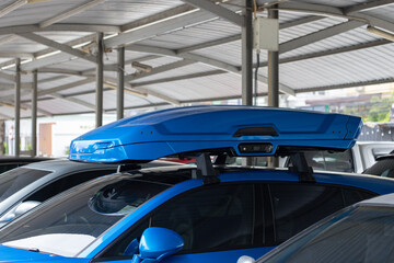 Trunk or cargo box on the roof of the car. Travel, family vacation. Accessories for transportation. travel Car Equipped with Roof Box.