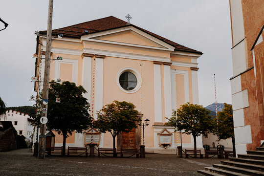 Front view of the historic parish church of Peter and Paul in Castelrotto (Kastelruth), South Tyrol