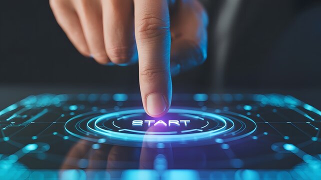Finger pressing glowing blue start button on futuristic digital interface touching