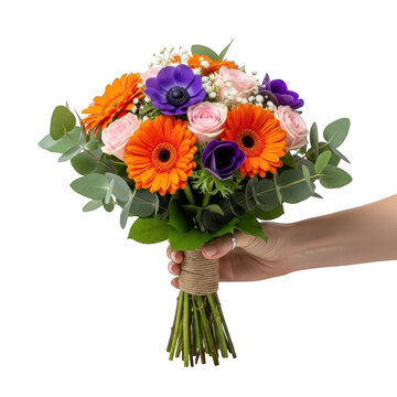 A vibrant bouquet of orange and purple flowers held by a hand isolated on transparent background