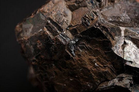 Close-up dark metallic mineral rock