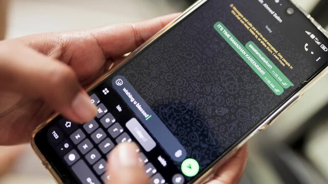 Typing Ramadan Kareem Message On Chat App. Sending Ramadan Wishes Through Mobile Chat