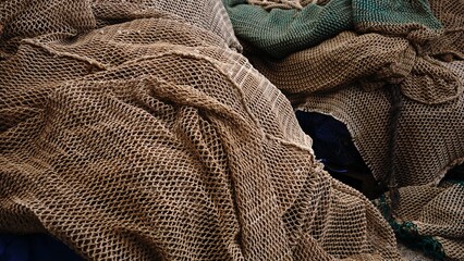 stacked fishing nets as background