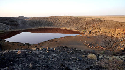 The red lake of Galyloma at sunset, Ethiopia © Stefano