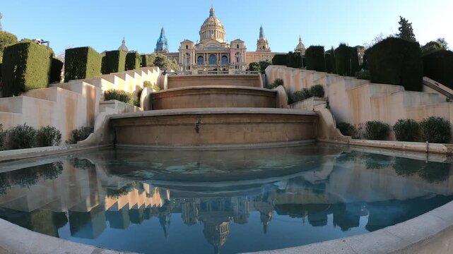 Barcelona / Catalonia / Spain - February 22, 2019: VIew of the Museu Nacional d'Art de Catalunya abbreviated as MNAC, is the national museum of Catalan visual art located in Barcelona, Spain.
