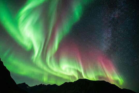 Stunning northern lights aurora borealis dance over Igaliku village at night in Greenland, vibrant green aurora glowing above dark Arctic landscape, beautiful polar sky phenomenon