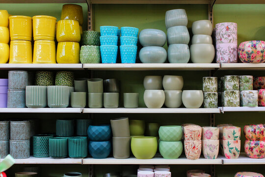 Colorful ceramic vases on display in a furniture store
