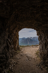 Obraz premium Dramatic mountain peaks and clouds view from Mount Pasubio, Italian Prealps.