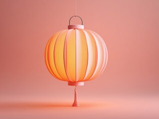 Obraz premium Glowing orange paper lantern hangs centrally against a soft coral monochromatic