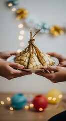 Hands Holding Traditional Dumpling on Plate.