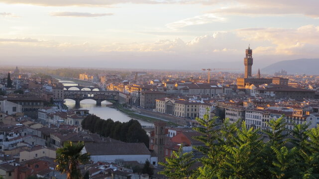 Panoramic view of Florence, Italy, at sunset. Famous view on Firenze and Santa Maria del Fiore Cathedral from the Michelangelo Square (Piazzale Michelangelo) in Florence, Tuscany, Italy