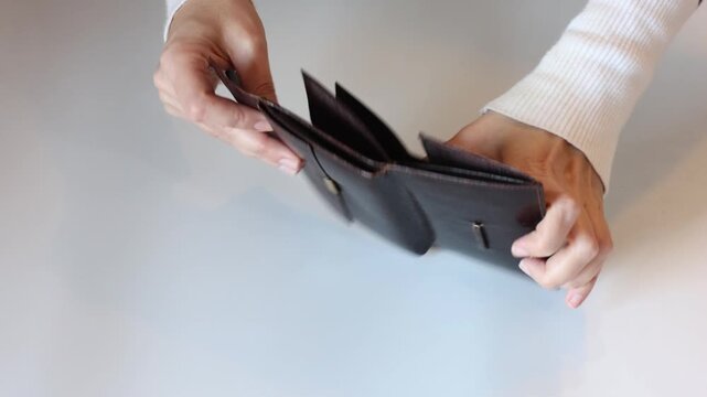 Empty Wallet on White Background &ndash; Minimalist Financial Concept