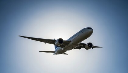 Fototapeta premium Commercial Passenger Jet Flying in Blue Sky 