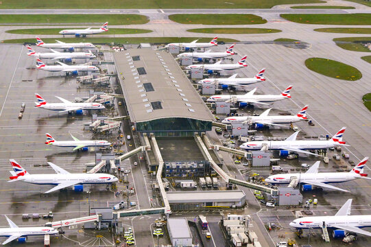 London, Middlesex, England, UK - 9 January 2026: Aerial view of a row of British Airways planes parlked at Terminal 5 at Heathrow Airport.