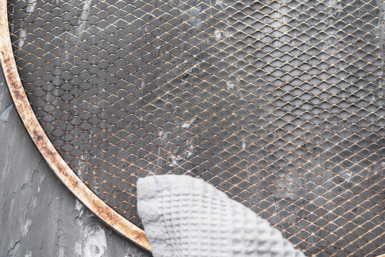 Waffle gray towel on gray textured background. Space for text.