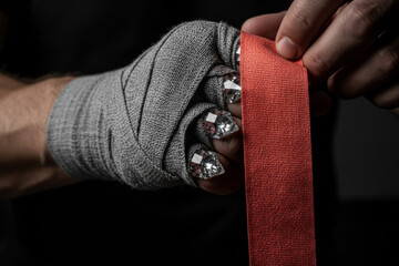Hand wearing silver chainmail glove holding red dragon scale skin texture. Dark medieval fantasy concept 3d render illustration for historical warrior games, roleplaying and mythical armor design