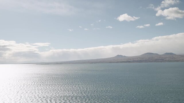 Slow motion handheld footage of lake Sevan in Armenia windy autumn season