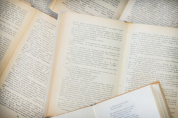 Obraz premium Top view of open books blurred background.