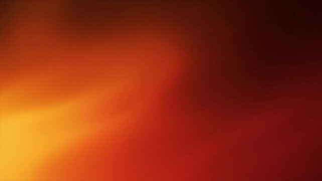 Soft Gradient Background with Blended Hues of Orange, Red, and Dark Tones color