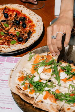 Delicious Pizzas Served at a Casual Dining Spot With Drinks