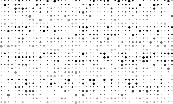 Halftone dots pattern in shades of gray on for design and texture
