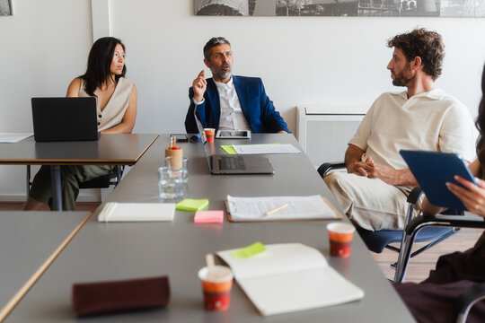 Manager talks in front of the group