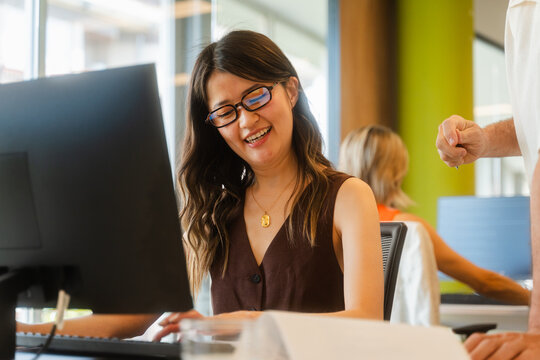 Woman works on a computer