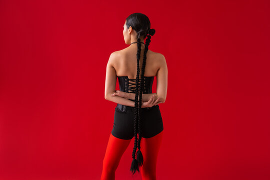 Back view portrait woman with braids hairstyle
