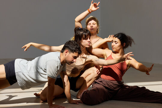 Creative dance performance in a sunlit studio