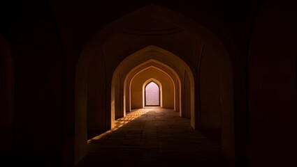 Naklejka premium Sunlight streaming through arched windows and hallway, casting dramatic shadows and illuminating the ornate details of an ancient passage.
