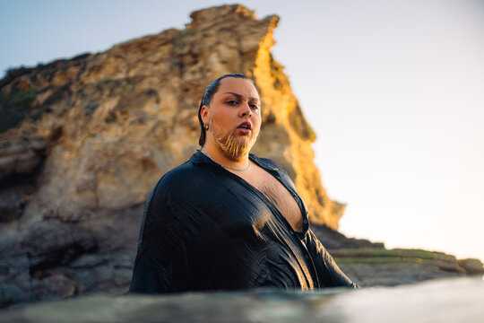 Captivating Portrait at Sunset by the Rocky Coast