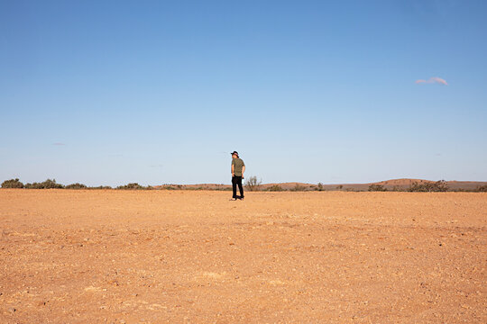 Man walking in the vast outback of Australia