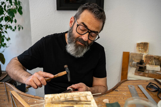  Artisan working in his workshop