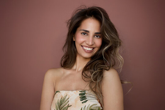 Cheerful woman portrait studio background