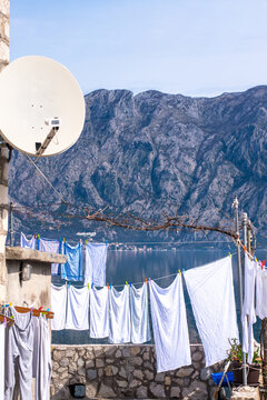 Laundry drying by the sea with mountain view in Bay of Kotor, Montenegro