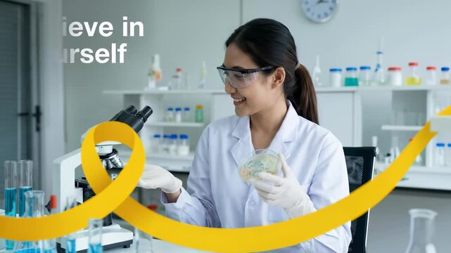 Smiling young female scientist in lab coat and safety goggles holding a petri dish in a modern laboratory setting with the text Believe in Yourself.