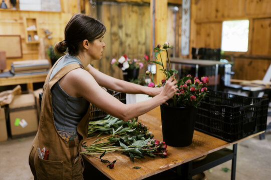 small business entrepreneur working and making flower bunches