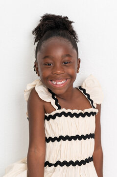 Happy girl with missing teeth