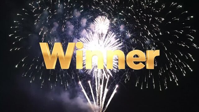 Golden 'Winner' text prominently displayed against a vibrant night sky filled with bursting fireworks explosions