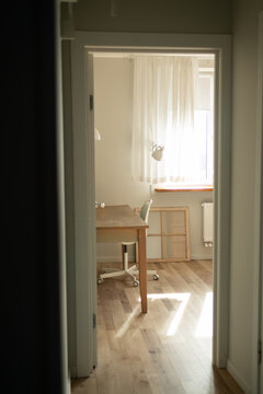 Bright Minimalist Office with Wooden Floor
