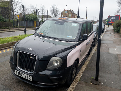 London. UK- February 19.2026. A front side view of a modern LEVC, electric capable, London black cab.