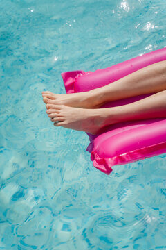 Woman unwinds in the pool