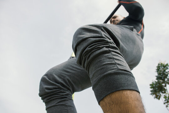 Person training outdoors with strength techniques
